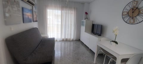 Acogedor apartamento en Daimús a 150 metros de la playa con parking privado y piscinas comunitarias Apartment in Daimús