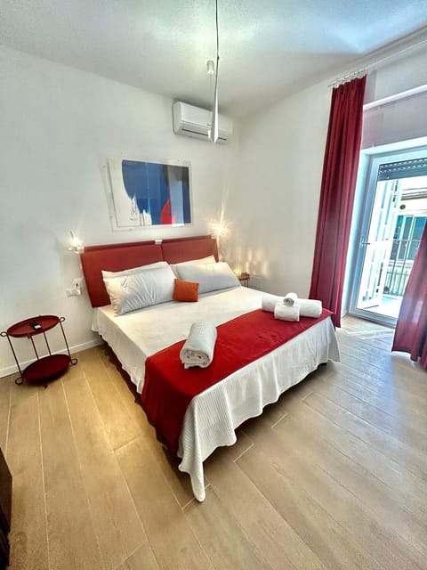 Bed, Photo of the whole room, Bedroom, towels, air conditioner