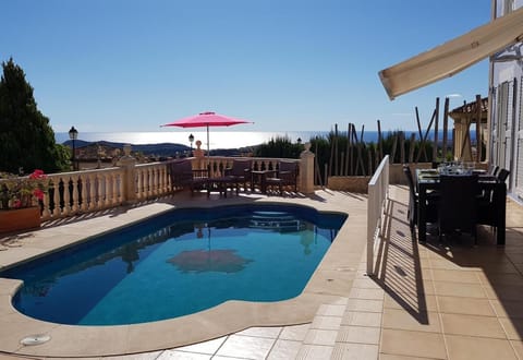 Property building, Living room, Swimming pool