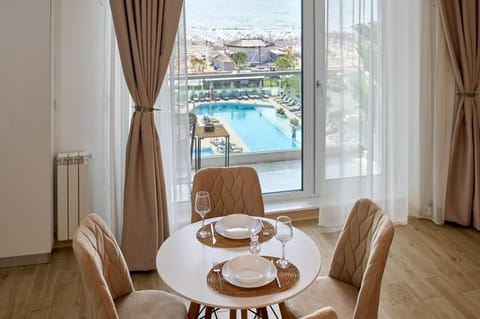 Natural landscape, View (from property/room), Balcony/Terrace, Living room, Seating area, Dining area, Pool view, Swimming pool