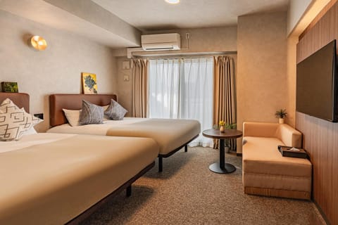 Communal lounge/ TV room, Bed, TV and multimedia, Living room, Photo of the whole room, Seating area, Bedroom, air conditioner