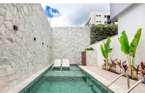 Swimming pool, sunbed