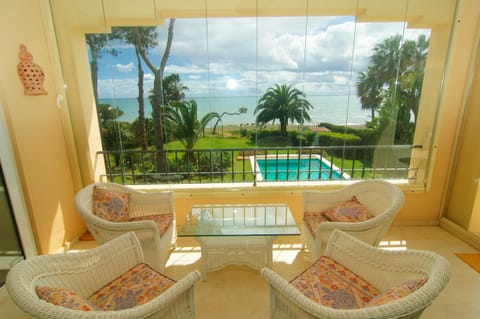 Balcony/Terrace, Seating area, Pool view, Sea view