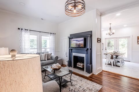 WALK TO TOWN! MTN VIEWS! HOT TUB! FIREPIT! SLEEPS 10 at Steps to Bryson House in Bryson City