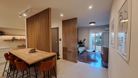 Kitchen or kitchenette, Living room, Seating area, Dining area