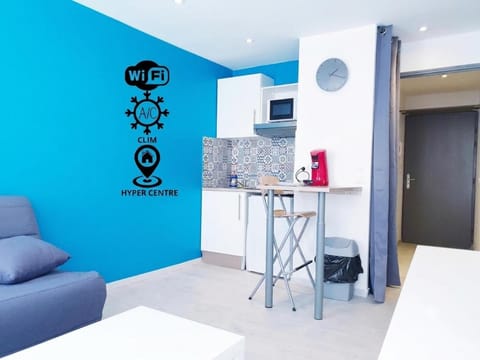 Kitchen or kitchenette, microwave, storage, stove