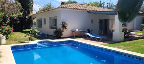 Patio, Day, Garden, Garden, Garden view, Pool view, Swimming pool, sunbed