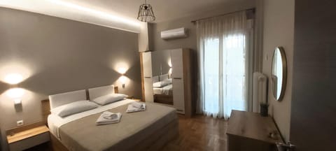 Bed, Photo of the whole room, Bedroom, towels, air conditioner