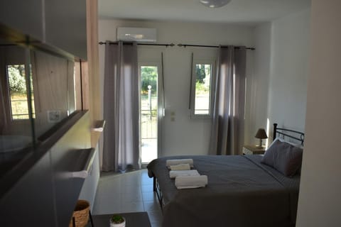 Bed, Photo of the whole room, Bedroom, towels, air conditioner