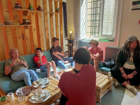 People, Living room, Seating area, group of guests