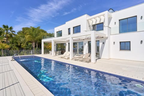 Property building, Living room, Swimming pool