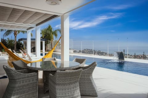 Property building, Living room, Swimming pool