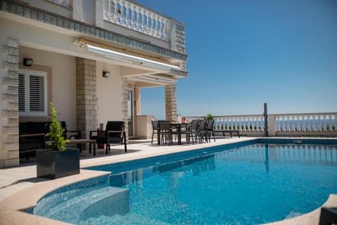 Patio, Day, View (from property/room), Balcony/Terrace, Pool view, Sea view, Swimming pool, sunbed