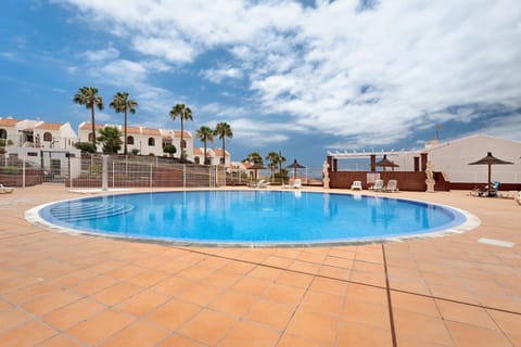 Property building, Living room, Swimming pool