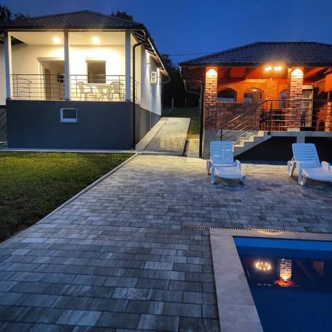 Patio, Night, Pool view, Swimming pool, sunbed