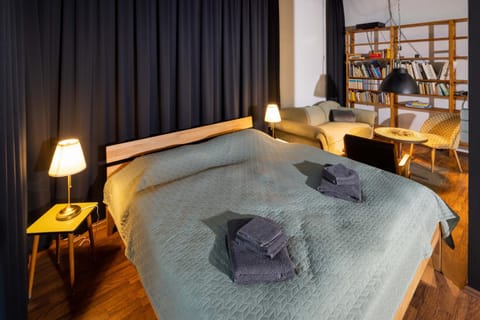 Bed, Living room, Seating area, Bedroom