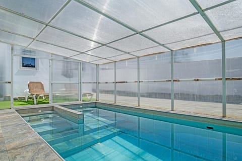 Property building, Living room, Swimming pool