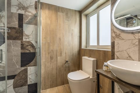 Studio apartment with twin beds & kitchenette at the new Olo living 24 Bed and Breakfast in Saint Julians