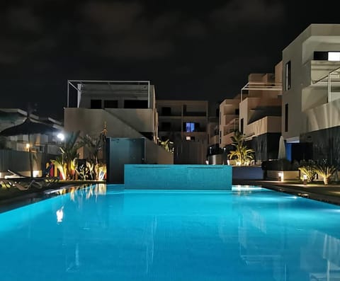 Property building, Night, Pool view, Swimming pool, sunbed