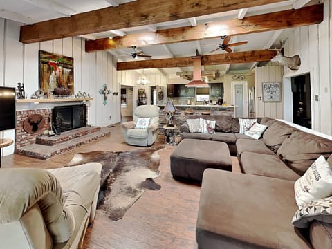 Kitchen or kitchenette, Living room, Seating area, fireplace, furniture, kitchen