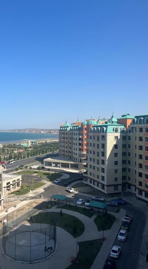 Property building, Day, Neighbourhood, Natural landscape, City view, Sea view, Street view, Location, Parking