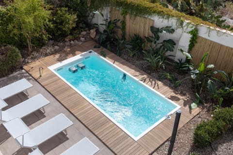 Property building, Living room, Swimming pool