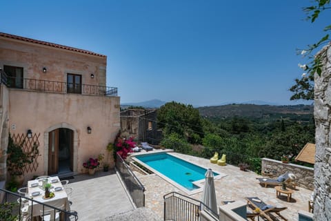 Property building, Patio, Day, Natural landscape, View (from property/room), Balcony/Terrace, Mountain view, Pool view, Swimming pool, sunbed