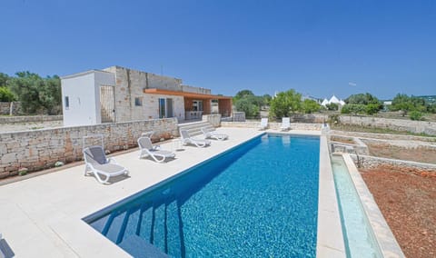 Property building, Living room, Swimming pool