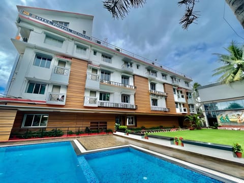 Property building, Day, View (from property/room), Pool view, Swimming pool, sunbed