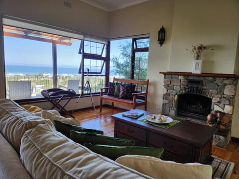 View (from property/room), Living room, Seating area, Sea view, flat iron