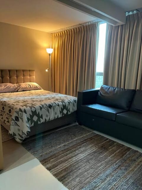 Bed, Living room, Seating area, Bedroom