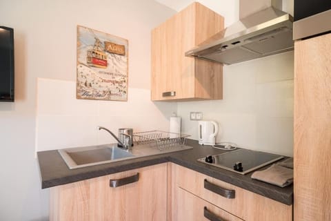 Kitchen or kitchenette, stove