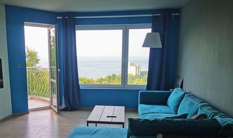 View (from property/room), Living room, Seating area, Sea view