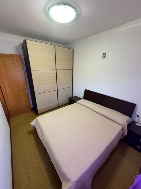 Bed, wardrobe