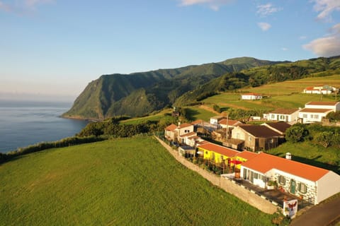 Property building, Nearby landmark, Day, Neighbourhood, Natural landscape, Mountain view, Sea view