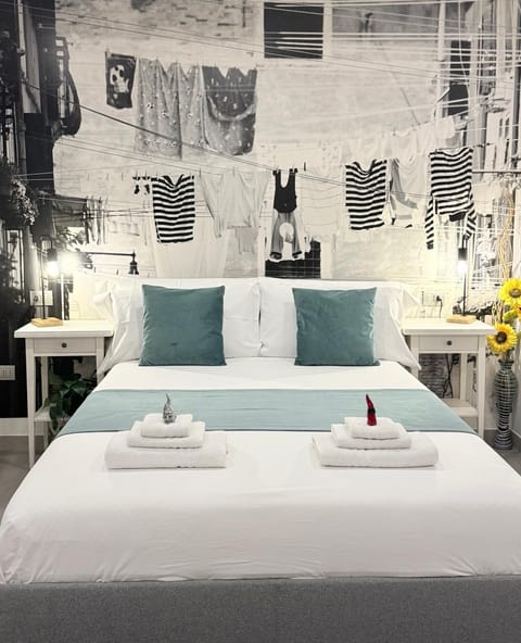 Bed, Photo of the whole room, Bedroom, towels, air conditioner