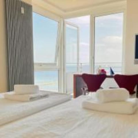 View (from property/room), Bedroom, Sea view, towels