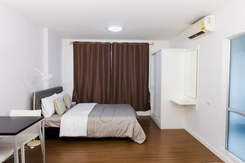 Bed, hair dresser, wardrobe