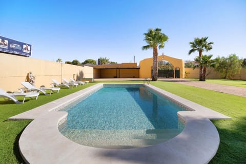 Property building, Living room, Swimming pool
