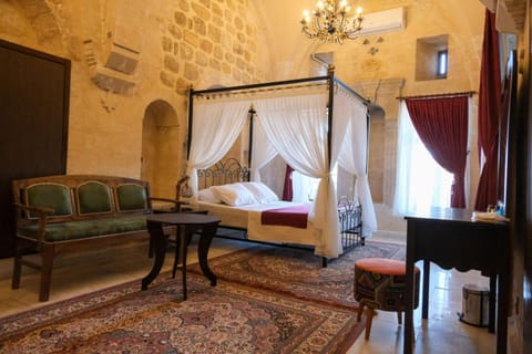 Bed, Seating area, Bedroom, hair dresser, air conditioner