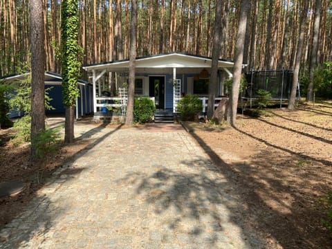 Sosnowy Zakątek - domek wakacyjny nad jeziorem w lesie House in West Pomeranian Voivodeship, Poland