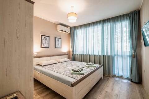 Bed, Photo of the whole room, Bedroom, towels, air conditioner