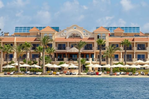 Property building, Day, Natural landscape, Beach, Sea view, Swimming pool, sunbed