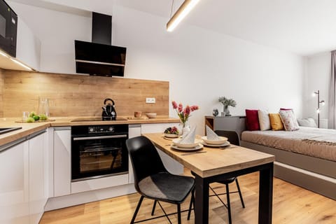 Bed, Kitchen or kitchenette, oven, stove