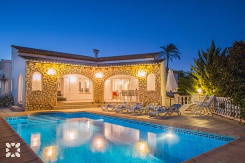 Property building, Patio, Night, Pool view, Swimming pool, sunbed