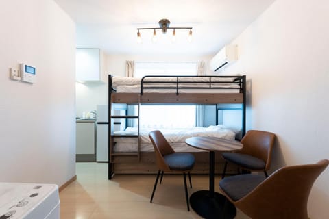 Bed, Living room, Seating area, Bedroom, bunk bed