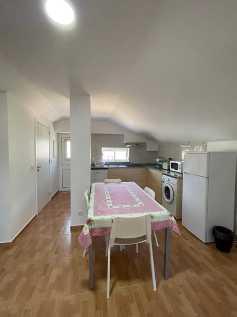 Kitchen or kitchenette, washing machine