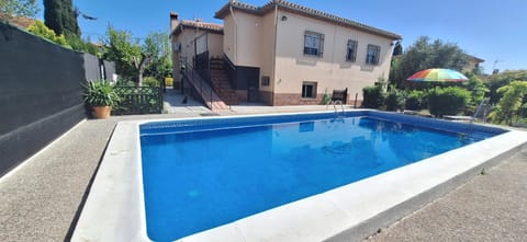 Property building, Day, Pool view, Swimming pool, sunbed