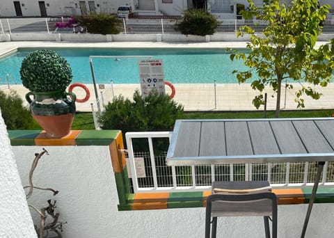 View (from property/room), Balcony/Terrace, Pool view, Swimming pool, sunbed