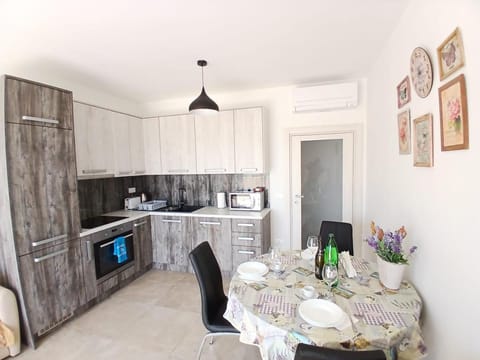 Dining area, microwave, oven, stove, kitchen